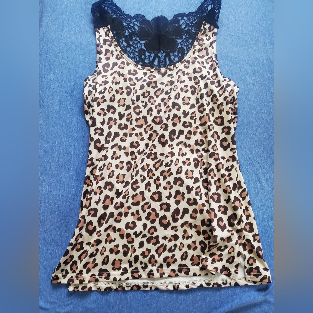 Leopard print tank with black lace straps and down the back. Medium.